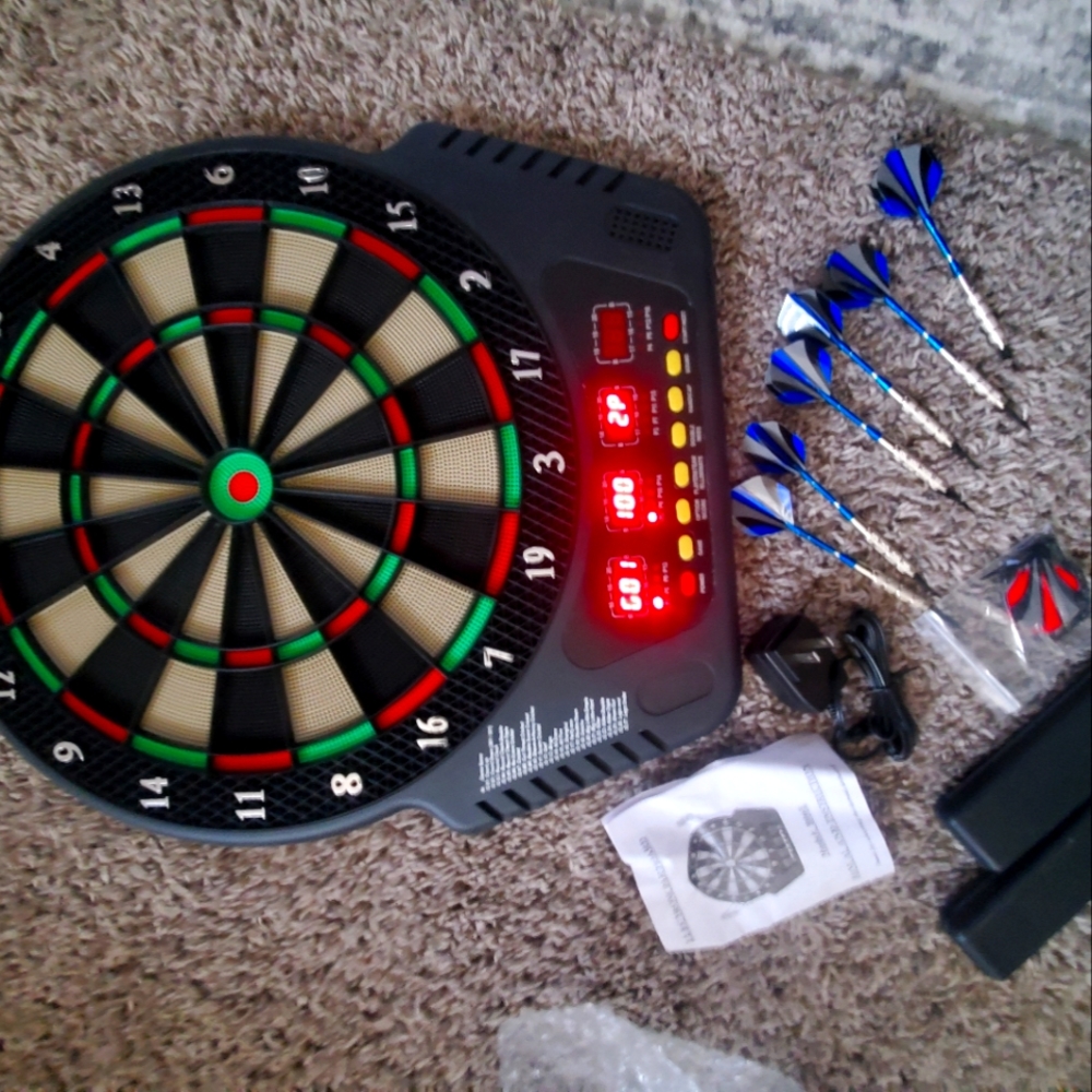 NWOT** but Still has box (Electronic dartboard plus the accessories)